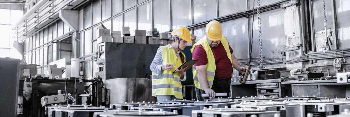 Engineers working in metal manufacturing industry. 